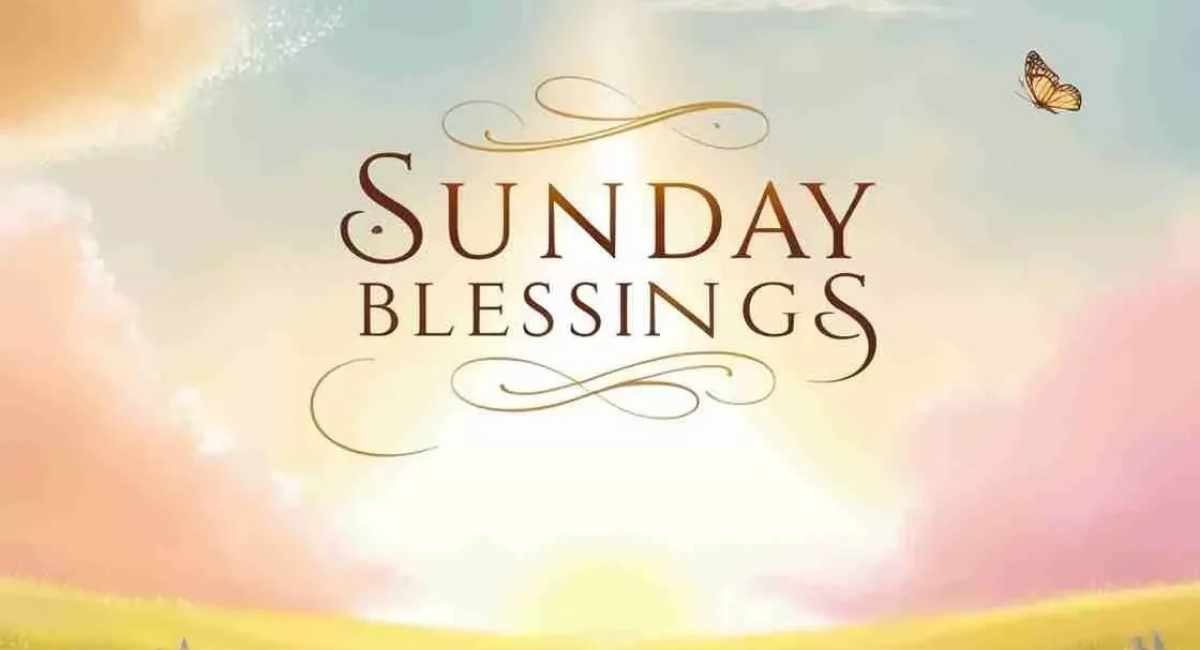 Sunday Blessings with a beautiful pastel sunrise sky, soft clouds, golden sunlight, and a butterfly.